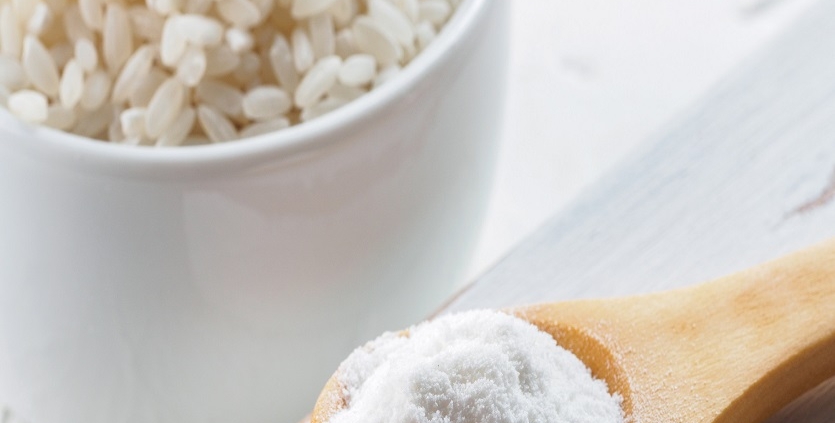 Syrup Powder and Maltodextrin from Rice in wooden Spoon